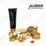 Bamboo grain cap for skincare plastic tube packaging