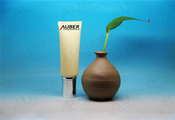 D30mm Light Yellow Pump Tube Packaging for Cosmetic Product with Metalized Cap