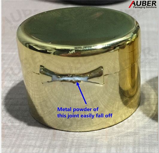 Metallic flip top cap